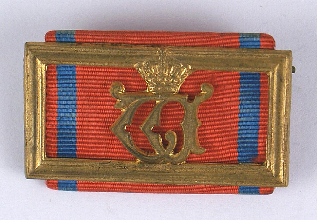 German Wurttemberg Militia Long Service Clasp: B-085 Imperial German Wurttemberg. Militia Long Service Clasp, 2nd Class 1891-1921. Gilt-bronze clasp shows almost no wear/age and is complete with hinge, pin, and catch. II