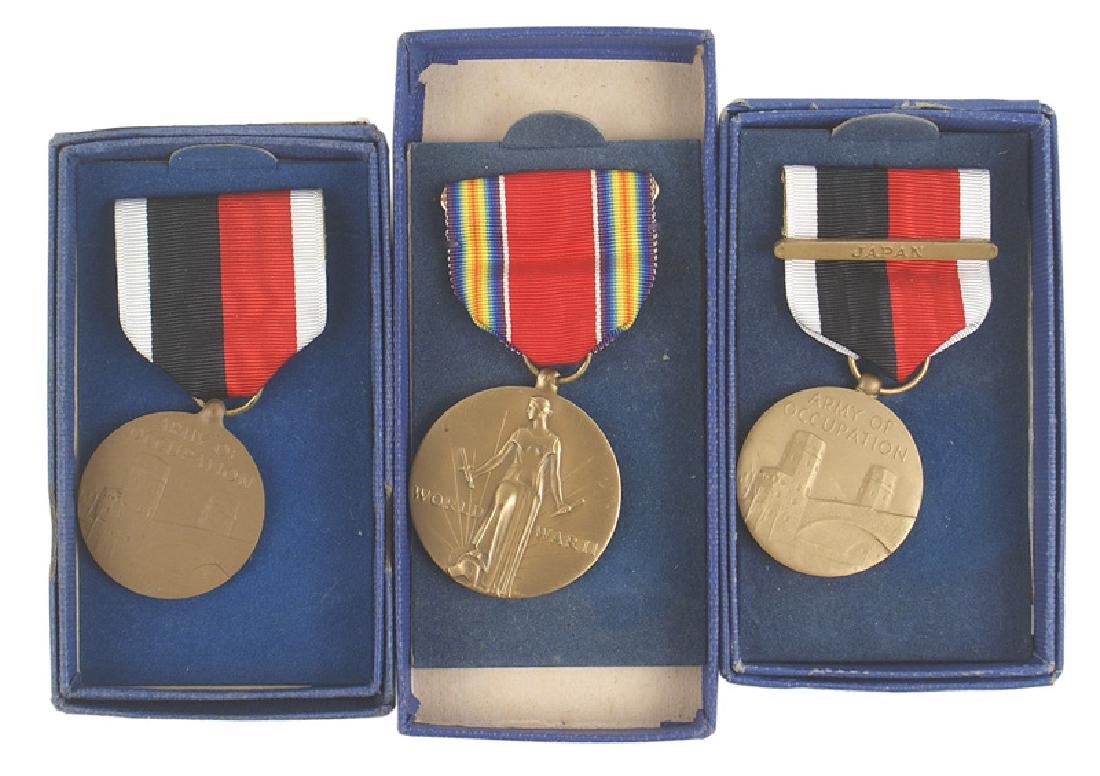 Lot of 3 U.S. WWII era boxed medals: B-310 Lot of 3 U.S. WWII era boxed medals: (1) Victory Medal (missing lid). (2) Army of Occupation-Japan. (3) Same with a "JAPAN" bar on the ribbon. I
