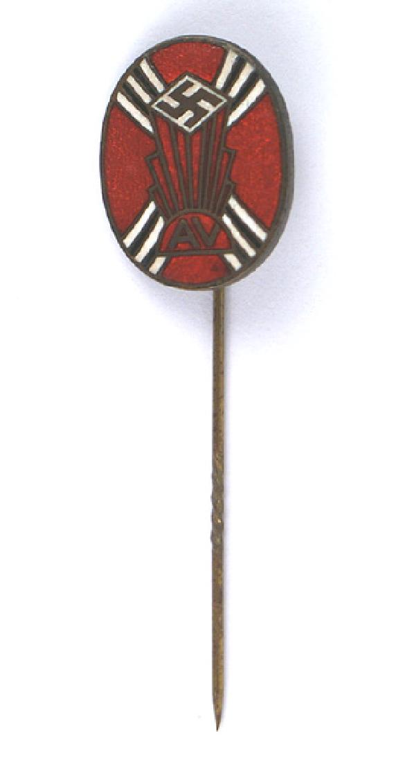 German American Bund Member lapel stickpin: B-345 German-American Bund Member's lapel stickpin. Oval, red enameled with a horizontal swastika on a white field at the top of rays eminating from an semi-circle with "AV". Reverse is maker marked i