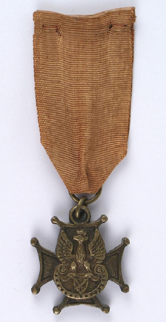 Polish Cavalry Cross Medal: B-361 Polish Cavalry Cross. Similar to above, but with no dates on the obverse. Reverse is engraved with crossed swords, "AO" and "1920". Original faded red ribbon. II