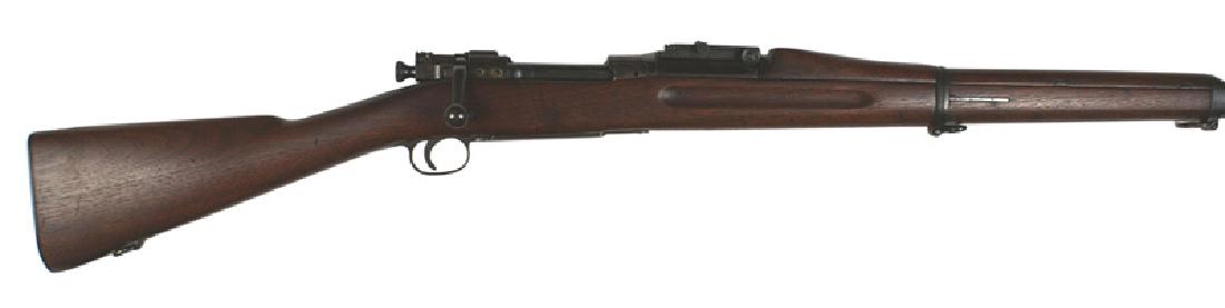 U.S. Springfield M1903 rifle: M-061 U.S. Springfield M1903 rifle. Barrel dated "8-13". Some light pitting in the bore. Light discoloration on the receiver. Finger groove stone. Removable cover over front sight. Marked "US" with th