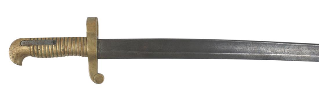 Civil War Merrill M1862 Navy Rifle bayonet: K-010 U.S. Civil War Merrill M1862 Navy Rifle bayonet. All brass ribbed grip/"bird head" pommel/crossguard and muzzle ring. Top of grip marked "6115". Press stud is missing but spring is intact. 25 1/