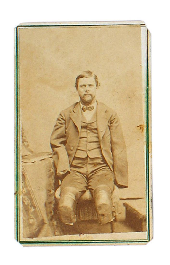 Civil War CDV photo UNFORTUNATE SOLDIER: K-028 Civil War CDV of Benjamin Franklin, "THE UNFORTUNATE SOLDIER". Printed story on reverse of how Franklin lost all his limbs to freezing while crossing the Plains to Fort Ridgely, Minnesota. Rare.