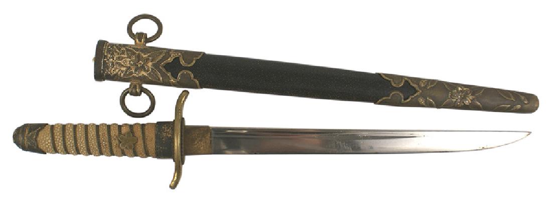 Japanese M1883 pattern Navy dirk dagger: D-129 Japanese M1883 pattern Navy dirk. Wire wrapped white fishskin grip with a sakura (cherry blossom) menuki on each side. Age darkened gilt brass pommel cap with a sakura and fuchi. Short "S" shape