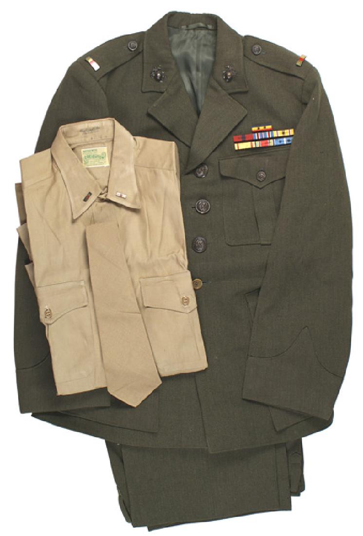 USMC WWII uniform etc Iwo Jima veteran: S-054 USMC WWII uniform and related items of Iwo Jima veteran Warrant Officer Michael Meza. Items include: (1) Walking-out tunic with EGA collar insignia, Warrant Officer shoulder bars and seven ribbo