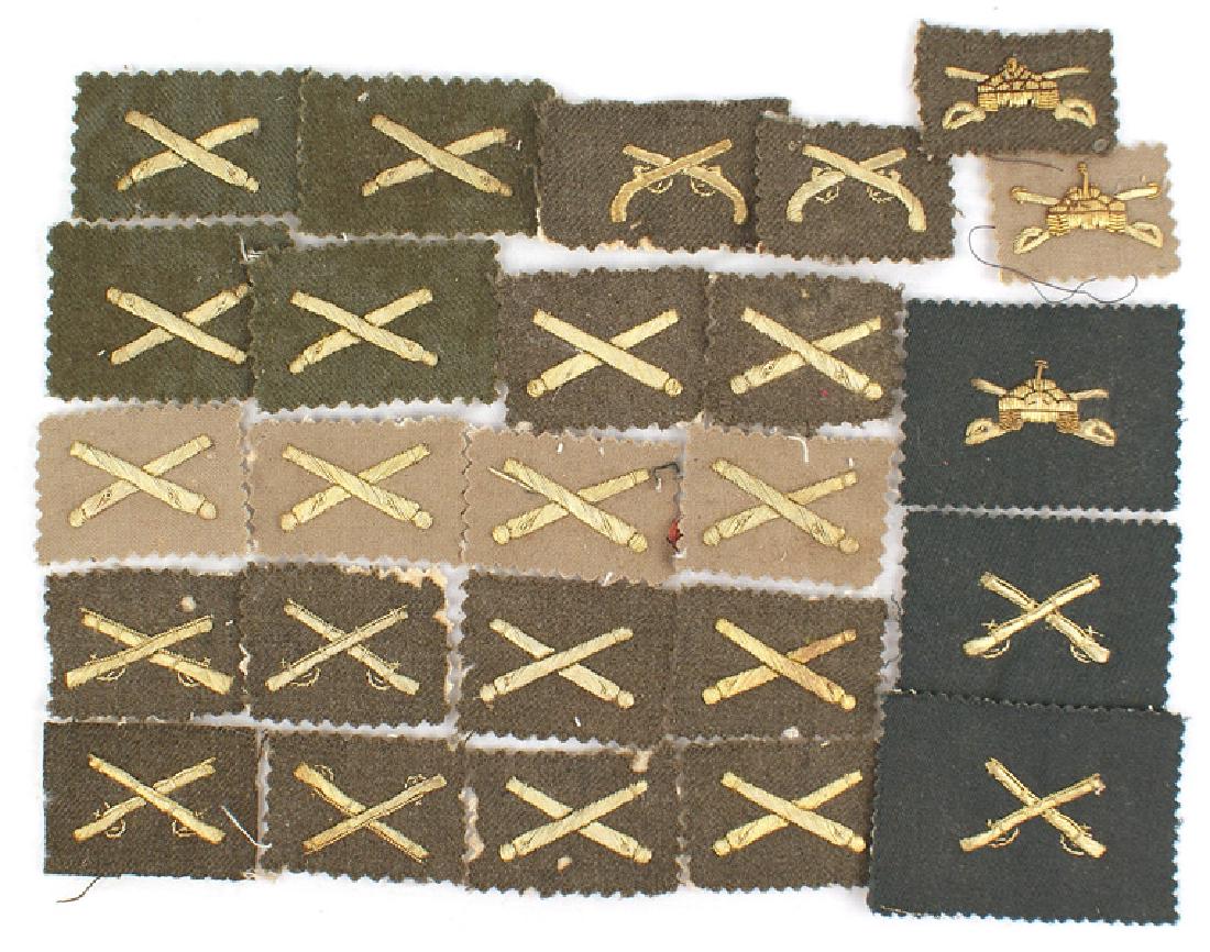 U.S. Officer embroidered uniform insignia: H-165 U.S. Officer's embroidered uniform insignia, made in Germany during the early occupation. All are gold bullion embroidered on squares of uniform cloth. Includes three different single Cavalry in