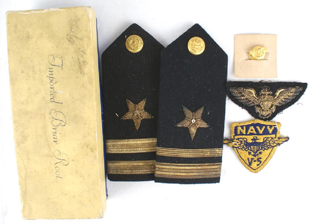 FLIGHT TRAINING PKG. Pilot training notes: H-201 FLIGHT TRAINING PKG. - Pilot - Kenneth Winterbottom - 1950's. Includes flight training notes (FJ-2 & F9F) on knee pad, cloth V-5 patch, both metal and cloth Navy pilot's wings, 2 LtJG epaulets, 