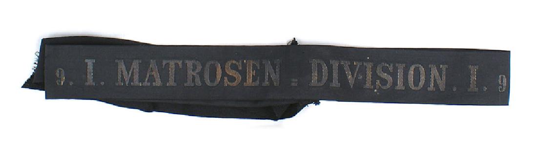 Imperial German MATROSEN cap tally: E-144 Cap tally similar to above - "9. I. MATROSEN - DIVISION. 1.9". Age toned gold lettering on black. II