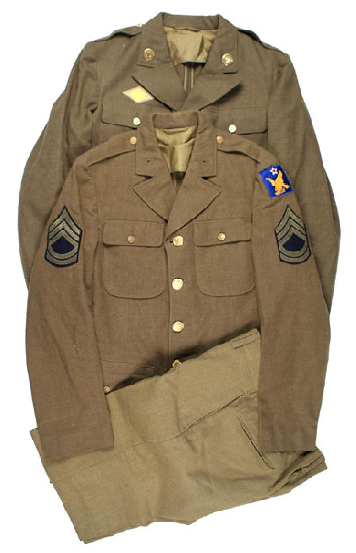 U.S. Army Air Force WWII uniform lot tunic: F-063 Army Air Force WWII uniform lot. Includes: (1) Cadet-M1939 OD wool, 4-pocket, open collar tunic. With gilt eagle buttons, "US" and winged propeller collar discs and an embroidered "Ruptured Duck