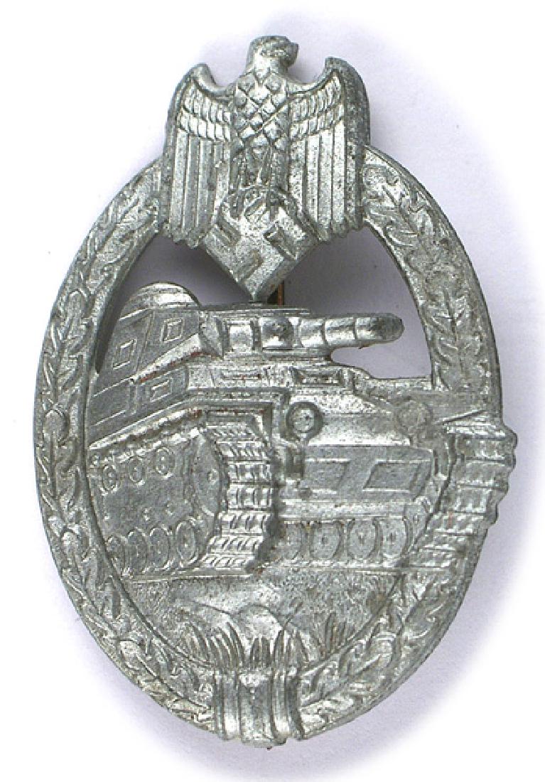 German WWII Panzer Assault Badge Silver: B-142 Panzer Assault Badge - Silver. Solid type with a "dished" reverse. II
