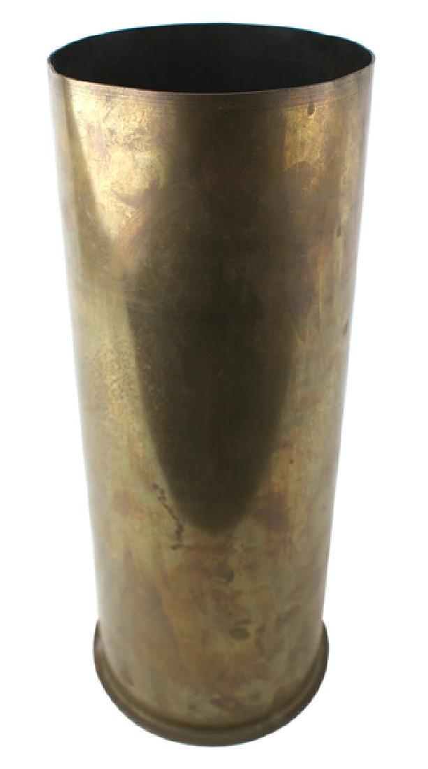 US WWII 5 MK6 brass shell casing: M-085 U.S. "5 MK6" brass shell casing. Marked "TEXT CTG. CASE" and dated "4-45". 15" tall. Weight 9.25 lbs. II