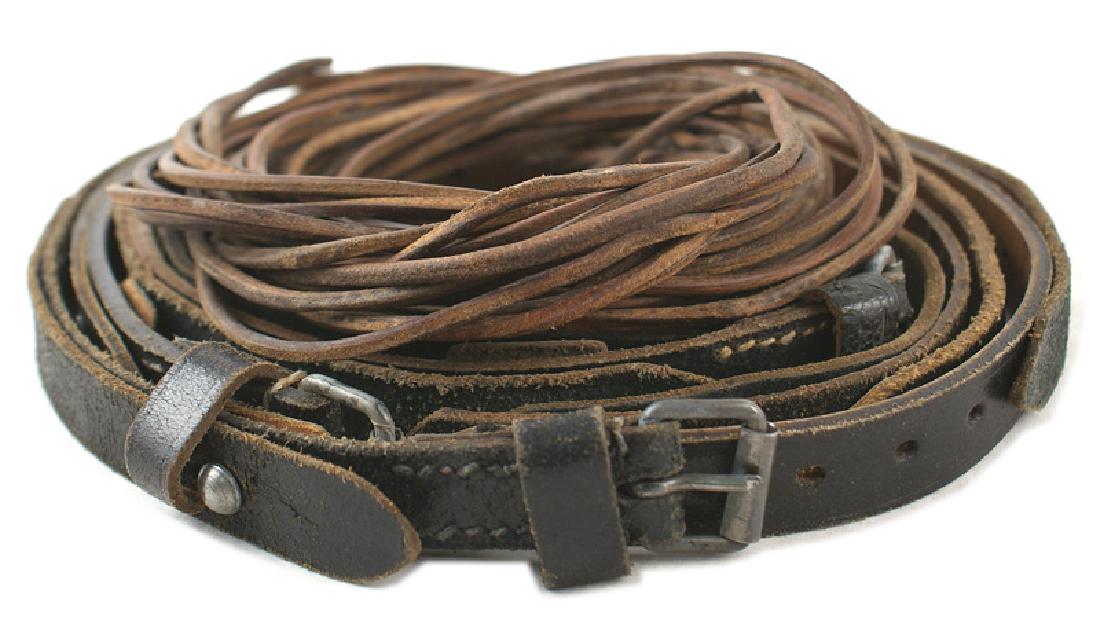 Lot of 5 German Army WWII rucksack bag straps: N-005 Lot of 5 German Army WWII rucksack equipment straps. Also eleven leather shoe laces for ankle boots. II+