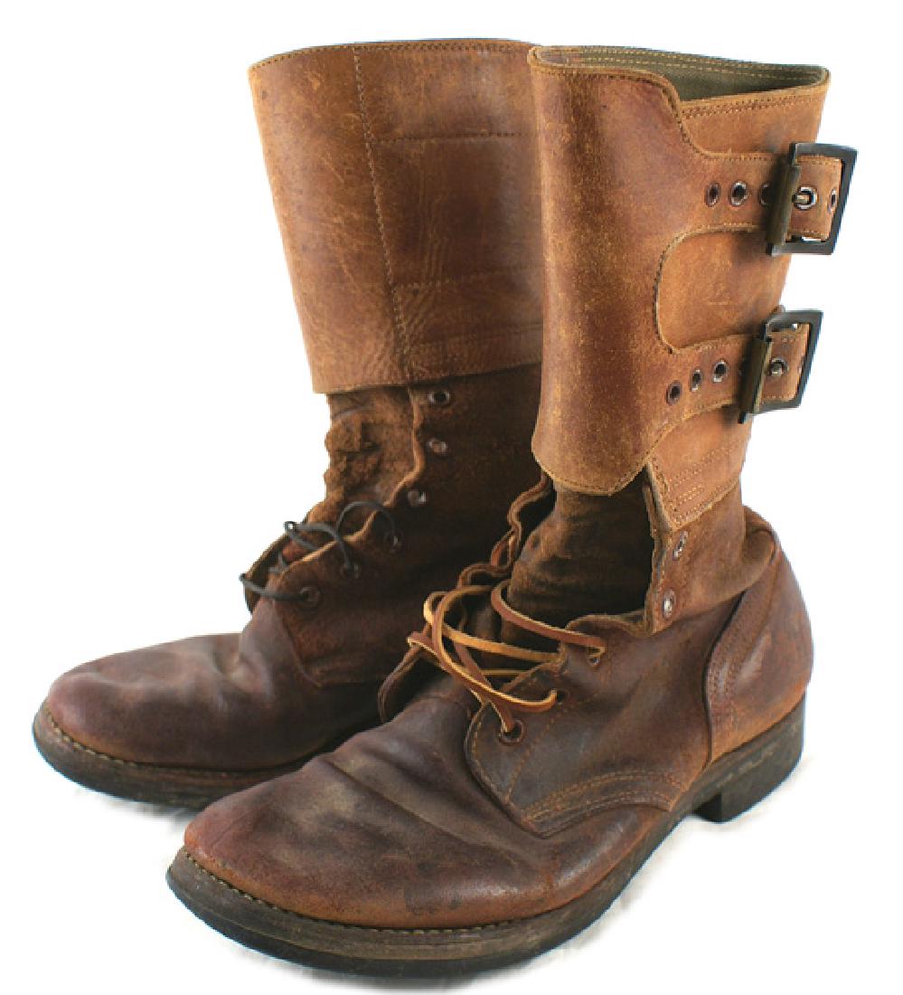 U.S. WWII Ski Mountain Troops boots: N-054 U.S. WWII Ski/Mountain Troops boots. Ankle high heavy leather with a reinforced toe and ankle. Lace up front. Leather soles and heels with a grooved center around the perimeter. Size 8 1/2. Weig