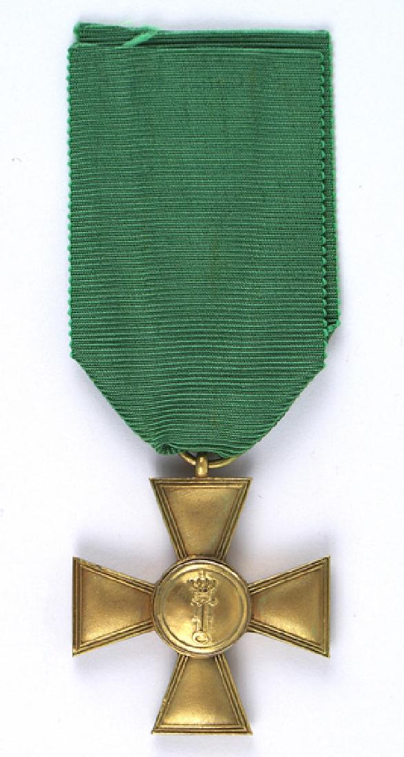 German Anhalt Long Service Cross medal: B-005 Anhalt Long Service Cross. 1st Class - 15 years service. Medal and ribbon show light age/wear with no damage. II+
