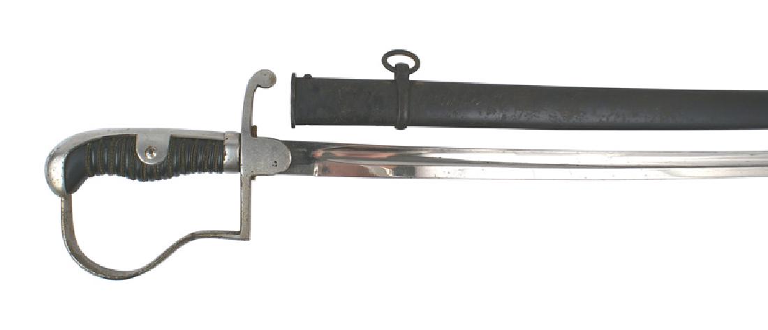 German WWII private purchase Ordnance Sable sword: D-078 Third-Reich private purchase Ordnance Sable. Nickeled fittings (shows some areas of wear). Braided wire wrapped black Bakelite grip. Unmarked 30 1/2" blade (some spotting on spine and towards ti
