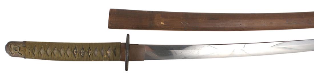 Early Japanese katana Samurai sword: D-080 Early katana. Olive cord wrapped white sharkskin grip. Floral menuki, military pommel cap and plain copper fuchi. Plain round iron tsuba. 25 3/4" curved blade with a flowing waves temperline. Gr