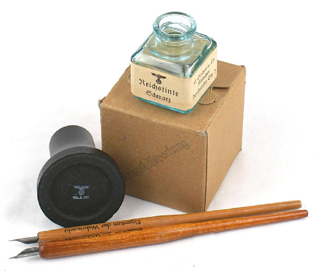 German WWII Army desk set ink well pens: H-084 Third Reich Army desk set items: (1) Ceramic ink well. Base is marked with an eagle/swastika. With original cardboard box. (2) Glass ink well. Original paper label with an eagle/swastika, maker