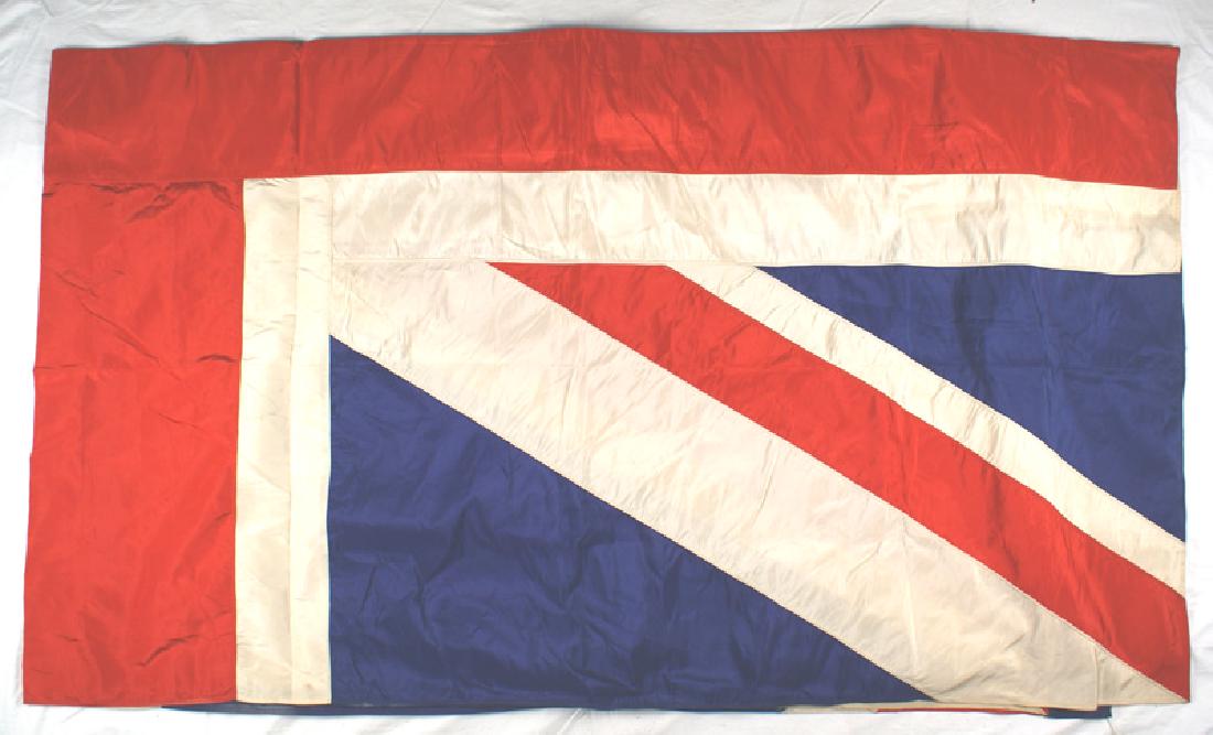 British parade Union Jack: H-148 British parade "Union Jack". Silk like material. Vibrant colors. 3 1/2" pole sleeve. 72" x 120". Excellent I