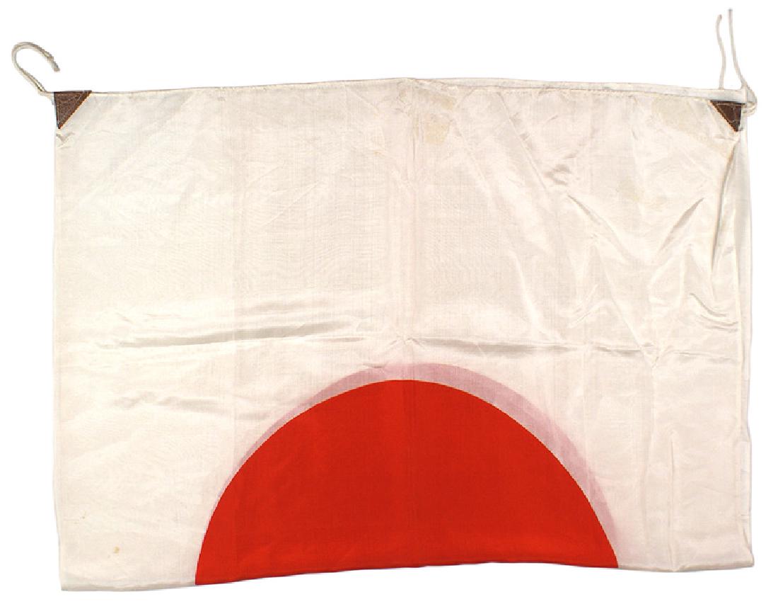 Japanese WWII silk meatball flag: H-158 Japanese WWII silk "meatball" flag. 39" x 22". With leather corner tabs with ties. Several small subdued stains, otherwise very good. II