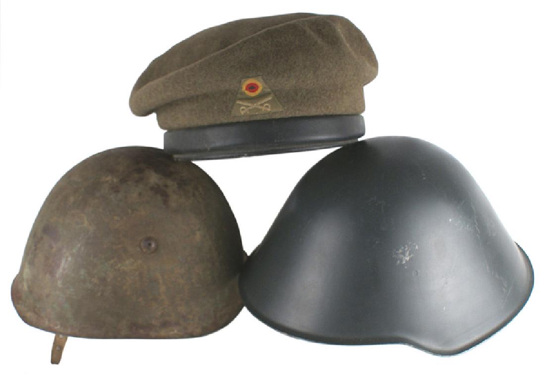 Lot of 3 helmets Italian WWII Army DDR West German: E-053 Lot of 3 helmets: (1) Italian WWII Army - retaining 60% of the original green finish. Leather liner is missing but steel band and leather chinstrap remain. Some rusting internally. II- (2) DDR (