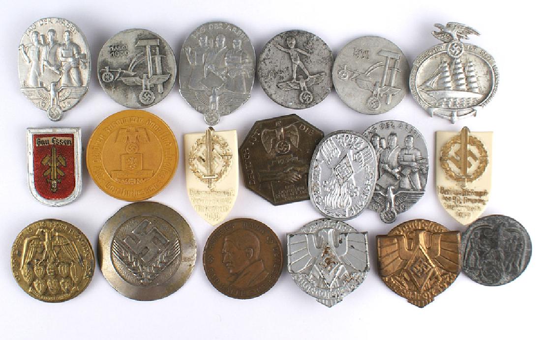 Lot of 18 German WWII tinnies: B-070 Lot of 18 Third-Reich "tinnies". Includes three May Day, three 1935 "TAG DER ARBEIT", two SA, four Hitler Youth, "Gau Essen", etc. Also, a "Hitler's DANK" for Gau Halle - Merseburg - 1933-34". I