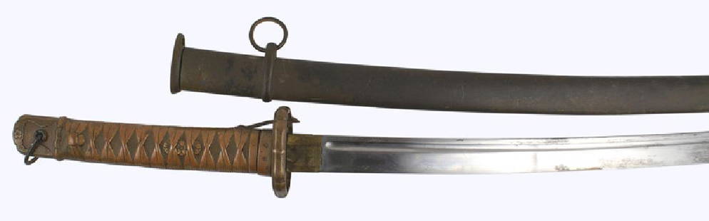 Japanese WWII NCO katana samurai sword: D-138 Japanese WWII NCO katana. All metal simulated cord wrapped handle with menuki. Pierced brass tsuba. 26 1/2" curved blade with a fuller and serial number "2325". Several dark "finger print" patch