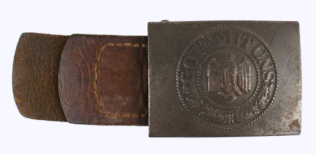 German Army WWII EM belt buckle: H-017 German Army WWII EM belt buckle. Steel with an eagle/swastika, "GOTT MIT UNS" and oak leaves. With leather tab dated 1940. II
