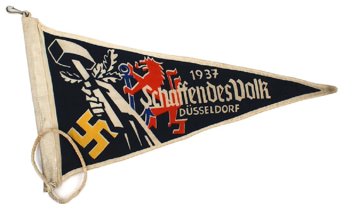 German WWII Automobile pennant Creative People: H-087 Automobile pennant for the 1937 National Conference of Creative German People in Dusseldorf. Colorful white bordered blue silk pennant using a gold swastika, white hand holding a hammer/oak leav