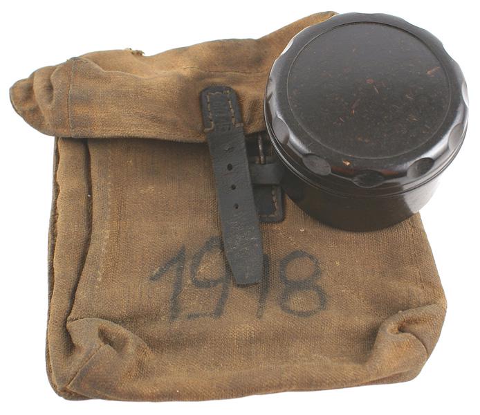 German WWII MG34/42 canvas pouch: M-037 German WWII MG34/42 canvas pouch. Reverse has two leather belt loops and a tab (marked "dtu 1944") with a "D" ring. Shows field use. Also with Bakelite grease container. II-