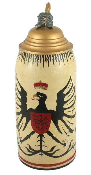 German Bavarian stein decorated eagle: G-004 Unusual German Bavarian one-liter crockery stein that has been artfully decorated. Pewter boots have been attached to the gold painted lid with a decorative thumb lift. The body has been painted