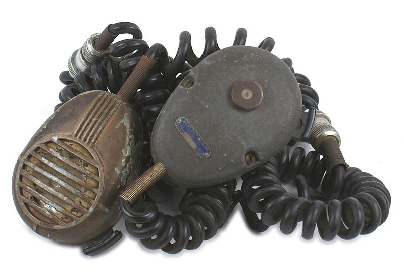 Lot of 2 US WWII hand held microphones: N-022 Lot of 2 US WWII hand held microphones. Both with a thumb operated on/off switch and spiral cord with a plug. Both have the maker's metal tag "SHURE BROTHERS INC CHICAGO USA MODEL NO CB15R". Sho