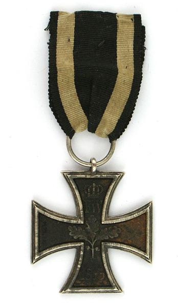 1813 Prussian 2nd Class Iron Cross: B-022 1813 Prussian 2nd Class Iron Cross. Obverse-flat black cross. Reverse: relief crown over "FW" oak leaves and "1813". Silver frame. Large suspension ring. Some wear to the black finish on the rev