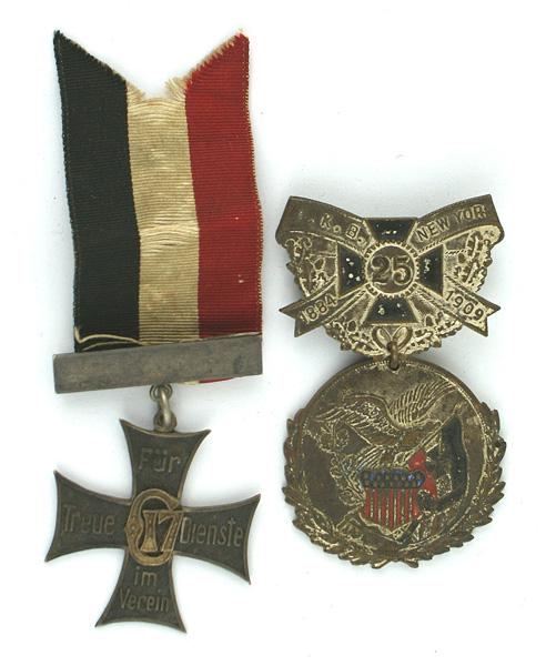 Lot of 2 German American Krieger Bund medals: B-162 Lot of 2 German-American Krieger Bund medals: (1) New York Chapter 1884-1909, 25 yr. Jubilee and 2yr. Delegate to the National D.K.B. (2) "FOR TRUE SERVICE IN THE ORGANIZATION" silver cross. Als