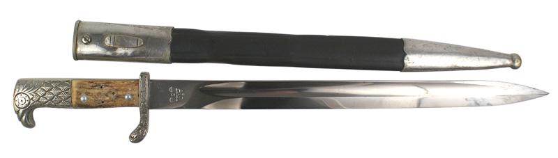 German WWII Police sidearm dagger bayonet: D-045 Third-Reich German Police sidearm. Nickeled eagle head/feathered pommel. Police eagle insignia missing from the stag grip. Oak leaves on short crossguard - numbered "S.E.I. 485". Basically, a cl