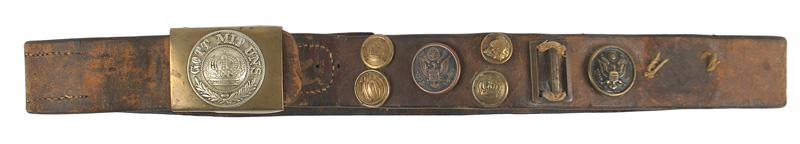 German WWI Hate Belt: H-161 German WWI "Hate Belt". Brass/nickel belt buckle with a relief crown, oak leaves and "GOTT MIT UNS". Attached to the brown leather belt are two U.S., two Prussian, one French and an unknown unif