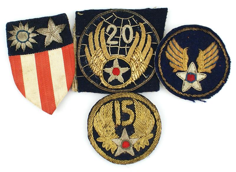 Lot of 4 US WWII patches CBI USAAF: H-173 Lot of 4 US WWII "Theater" bullion embroidered shoulder "patches": (1) CBI. Reverse - 5 snap - on devices. (2) USA.A.F. - gold and silver bullion. (3) 15th Air Force - gold and silver bullion. F