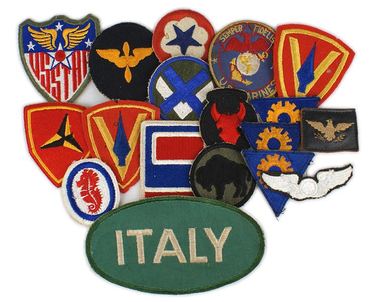 Lot of 18 US WWII uniform insignia: H-177 Lot of 18 U.S. WWII embroidered cloth uniform insignia which includes: 34th, 69th, 92nd Divisions; U.S.M.C. 3rd, 5th Divisions and an EGA shoulder patch, USAAF Cadet, Strategic A.F., Observer's 