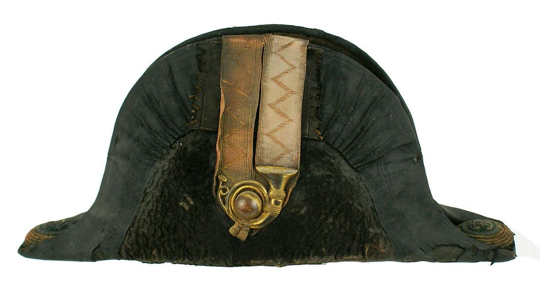 Imperial Austrian Jager officer cocked hat: E-004 Imperial Austrian formal dress Jager officer cocked hat. Black mohair body with a 2 1/2" wide "pinched" black silk ribbon sewn along the top borders of the turned-up brims. Center has two 1" wid