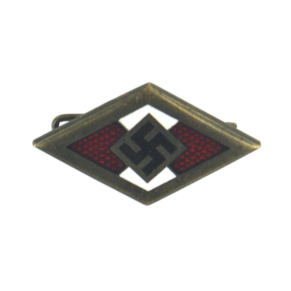 German WWII Golden Hitler Youth Honor Badge: B-016 German WWII Golden Hitler Youth Honor Badge. Basically, the same as the membership badge, but with an age toned gold background and border. Reverse marked "GES, GESCH", "RZM", M1/70" and serial 