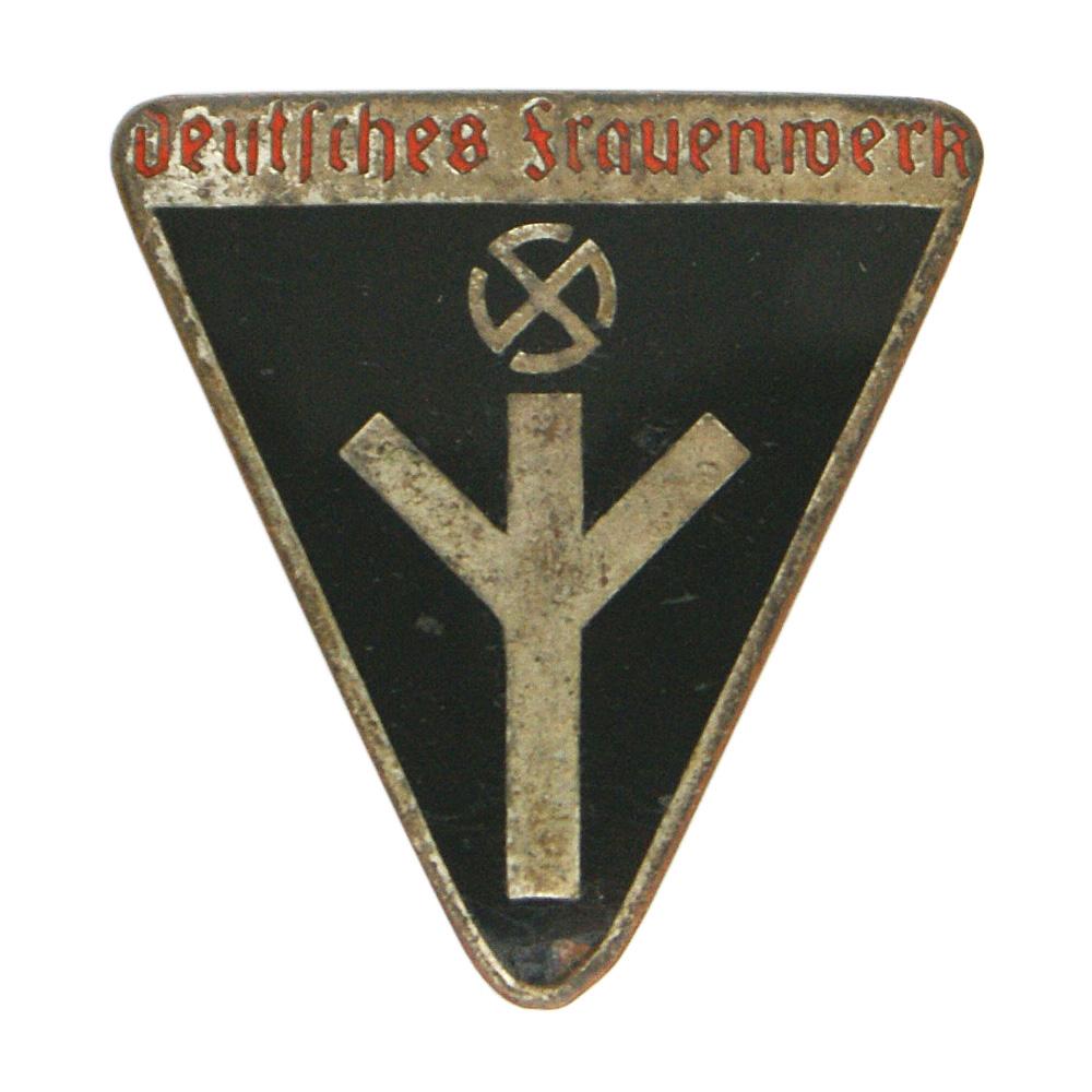 German WWII Women Work member badge: B-028 German Women's Work member's badge. Type III 1939 - 1944. Inverted triangle with a silver life sign, sun-wheel swastika and "Deutsches Fraeunwork". Reverse "RZM" and "M1/93". II