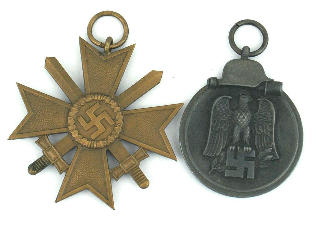 Two German WWII medals KvK Eastern Front: B-044 Lot of 2 German WWII awards: (1) 1939 KvK with swords 2nd Class (no ribbon). Ring marked "18" (Karl Wurster K.G. in Markneukirchen/sa.). (2) Eastern Front Medal (Russian Campaign). No ribbon. II