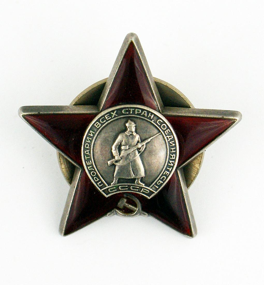 Russian Order of the Red Star Post WWII: B-138 Soviet Union. Order of the Red Star. Post WWII Silver. Center of a soldier with a rifle - on a convex enameled red star. Reverse is maker marked and serial numbered "3360733". Screw - post and t