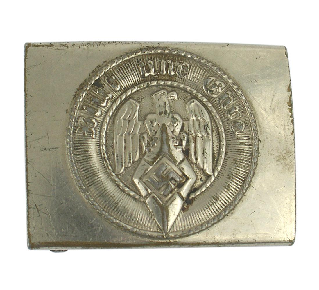German WWII Hitler Youth belt buckle: H-014 German WWII Hitler Youth belt buckle. Nickeled steel with a relief eagle/diamond/swastika and "Blut und Ehre". Reverse marked "RZMM4/39". II