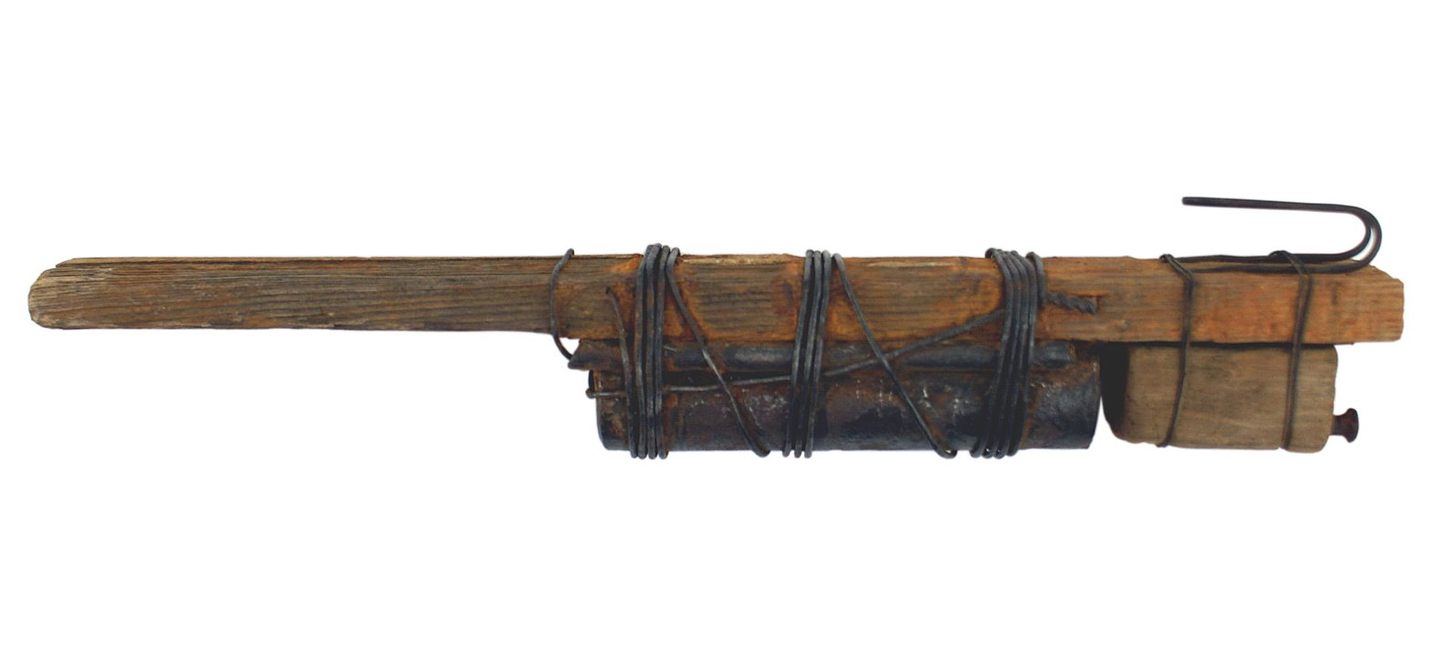 French WWI field made Raquette stick grenade: M-058 French WWI Field-made "Raquette stick" grenade. 5" section of pipe wired to a 13 1/2" x 1 1/2" section of wood. A small block of wood is loosely wired 1/2" above the pipe, and when an attached w