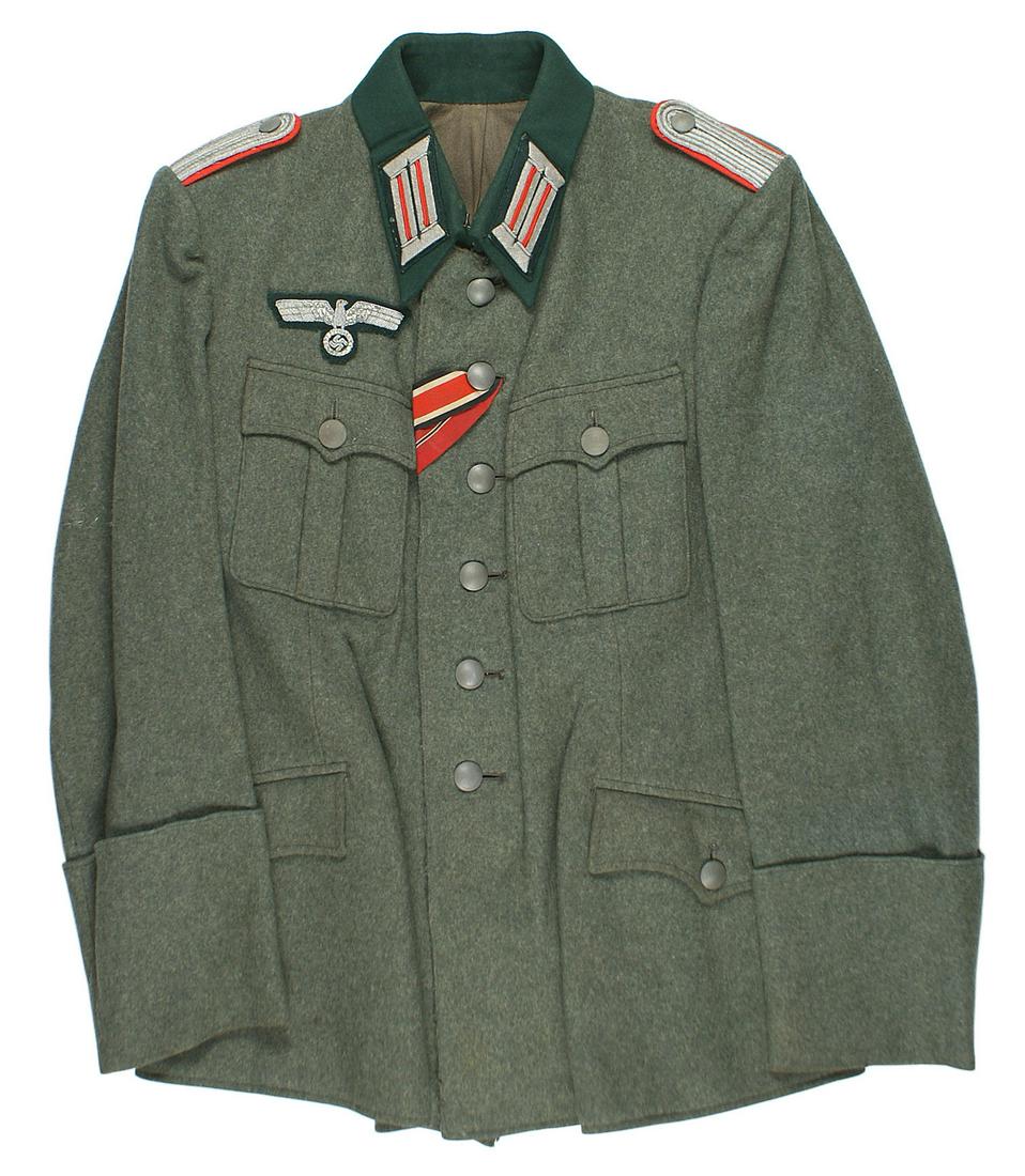 German WWII Artillery Leutnant wool tunic: F-009 German WWII Artillery officers rank of Leutnant, four pocket, wool tunic. Dark green collar. Silver-gray with red center collar tabs. Silver gray on red shoulder boards. Relief silver bullion ea