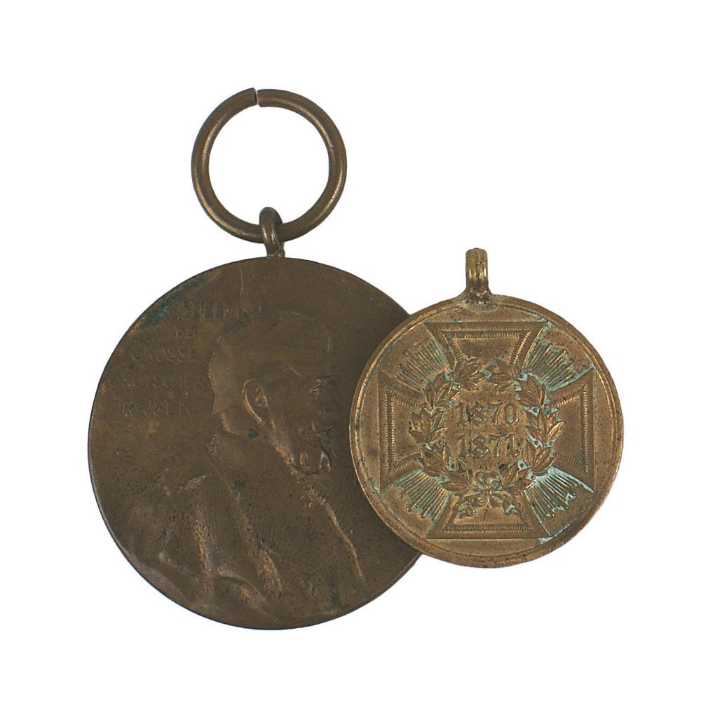 4 Prussian 1870 War Medals Wilhelm I: B-017 Prussia. Lot of 4 medals: (1) Two 1870-71 War Medals. No ribbons on is missing the ring. (2) Wilhelm I Centennial Medal. No ribbon. (3) 1914-1918 Combatants Cross with swords. No ribbon. II