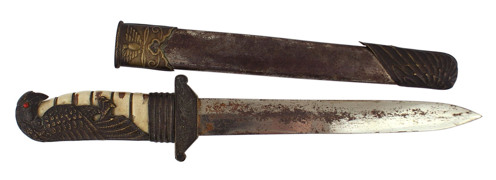 Chinese WWII period Air Force Officer dagger: D-032 Chinese WWII period Air Force Officer's dress dagger. Age toned detailed bronze falcon extending the entire facsimile tortoise shell - with the head over the pommel. Red stone eyes. Short crossg