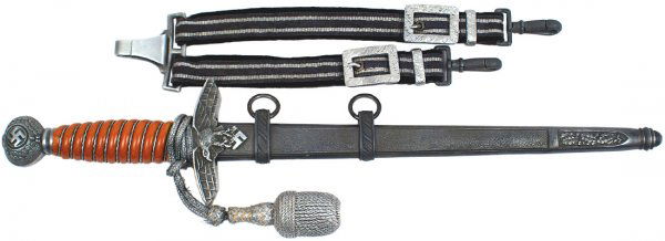 German WWII Luftwaffe 2nd Model dagger: Luftwaffe 2nd Model officer dagger – nice patina on pommel/eagle crossguard and scabbard. Silver wire wrapped amber grip (two chips at top). Excellent "Eickhorn"/seated squirrel logo marked blade. S