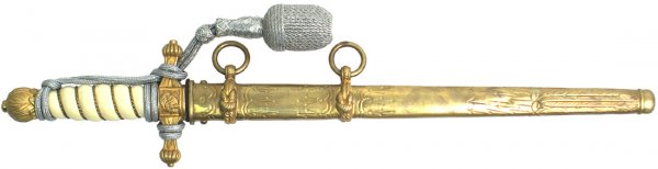 German Weimar Period Navy officer's dagger: Weimar Period Navy officer's dagger. Gilt brass "flaming ball" pommel and an anchor decorated, ball tipped crossguard. Braided gilt brass wire wrapped age-toned white celluloid grip. Minor chip at top