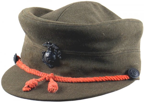 U.S. USMC WWII Women's bell-crown hat: USMC WWII Women's forest green bell-crown hat. Blackened bronze EGA insignia and side buttons. Age-toned scarlet cord with tassels sewn to visor. Black ribbon sweatband with a green silk lining. Named